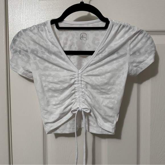 Bombshell Sportswear White Sheer Leopard V Neck Crop Tee Shirt STRETCHY XS S - Picture 1 of 4